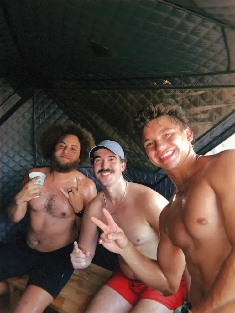 Men enjoying the sauna together