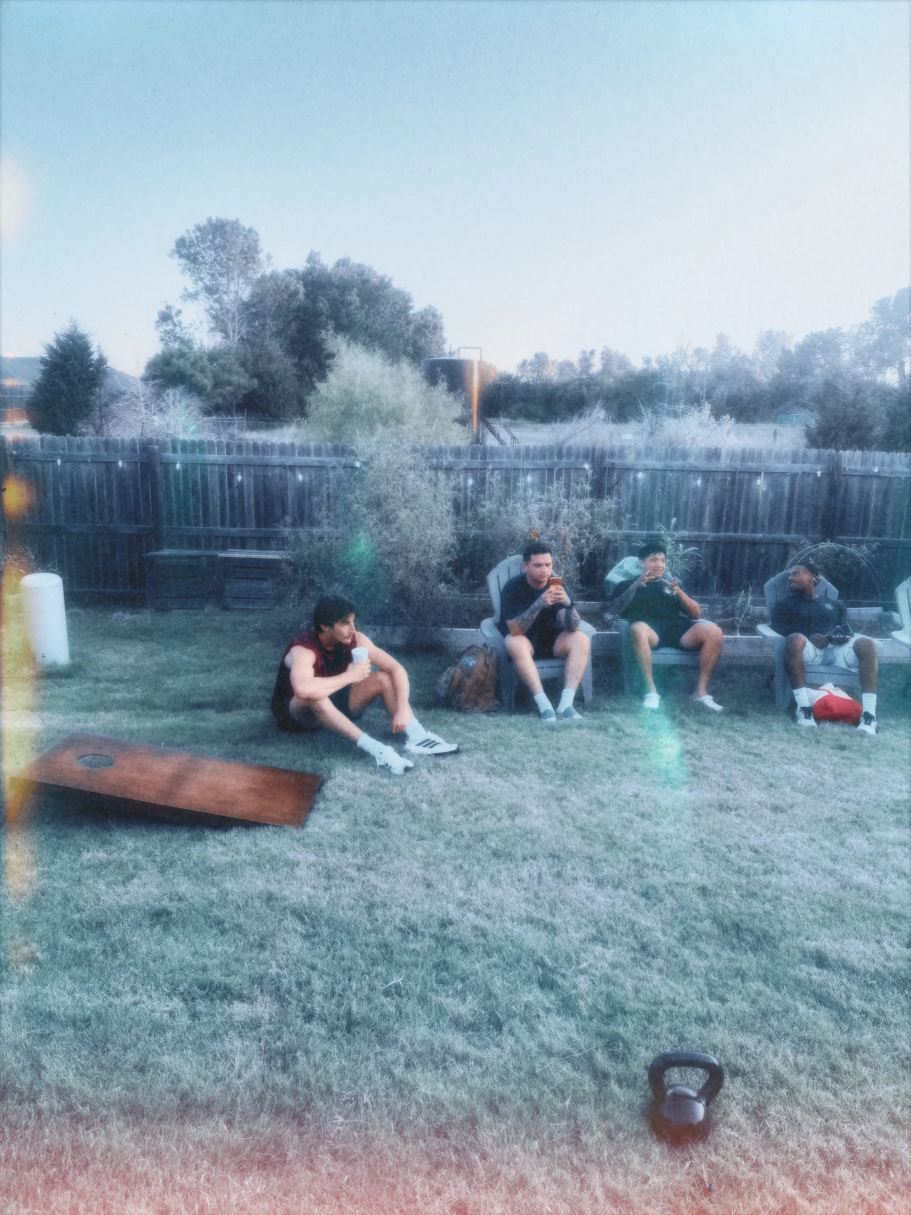 Men hanging out in lawn chairs after a meetup