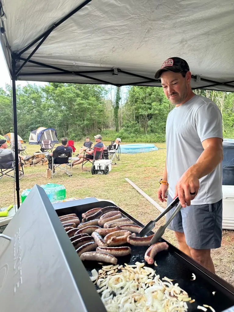 Grilling brats and onions at Runathon