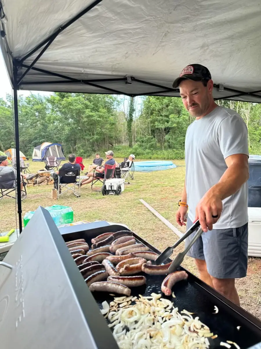 Grilling brats and onions at a hangout